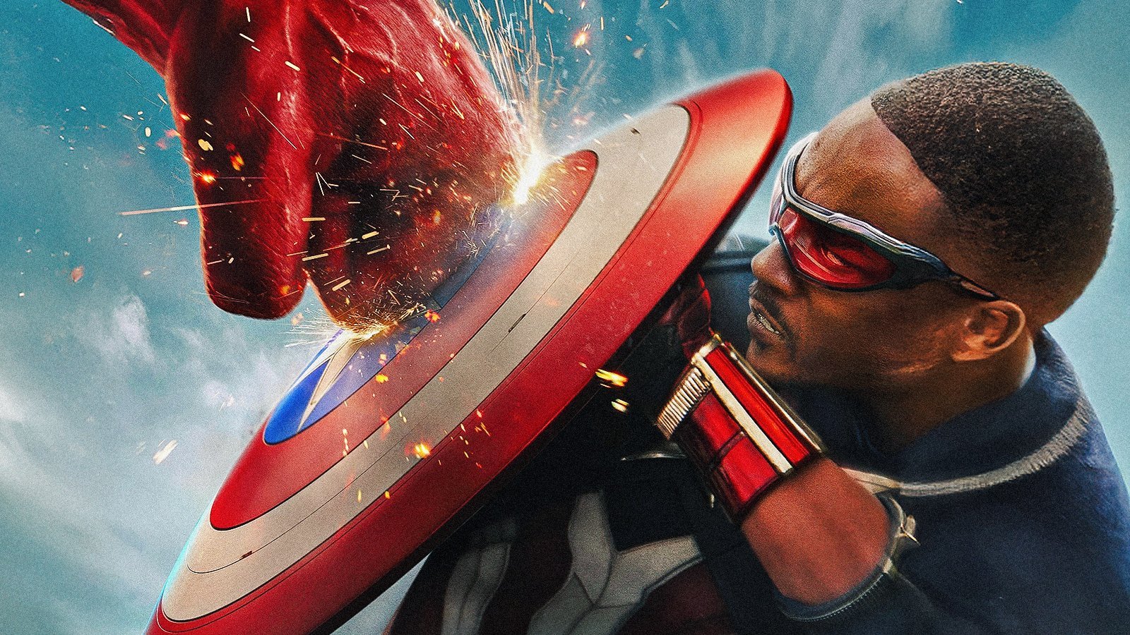 Sam Wilson con lo scudo di Captain America in mano e il pugno di Hulk Rosso che lo colpisce